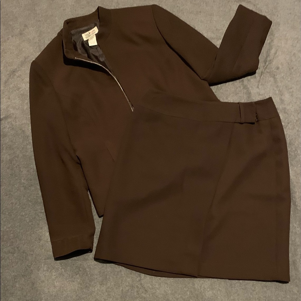 Stylish woman’s suit size 6.